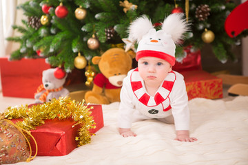  baby with costume snowman with Christmas tree