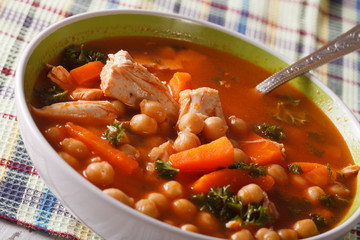 Delicious chickpea soup close up in a bowl. horizontal
