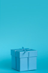 Blue gift box with ribbon