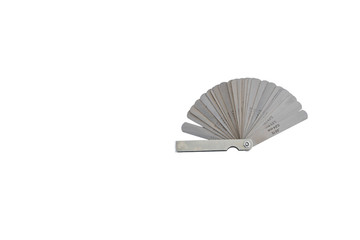 old feeler gage white isolated