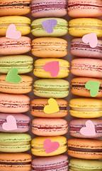 French colorful macarons background, close up