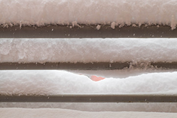 Snow on the balcony in frontal view