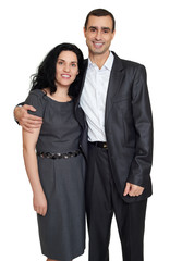 Happy couple portrait at studio dressed in classic clothes