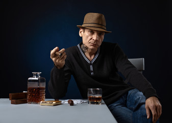  player with whiskey and cigar