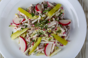 Salad with chicken and radish