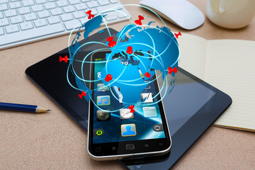 Modern mobile phone with travel icon application