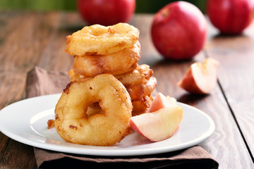 Apple rings on white plate