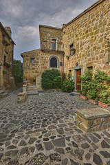 Fototapeta na wymiar Beautiful corners and streets of the medieval small town in Lazio, Civita di Bagnoregio, Italy, EU