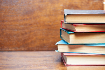 Five old books on the table