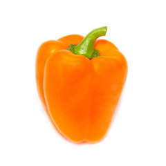 Orange paprika isolated on white.