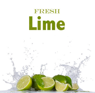 Fresh lime in water splash on white