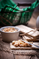 Homemade sandwiches with crisp bread, tuna and egg on a wooden t