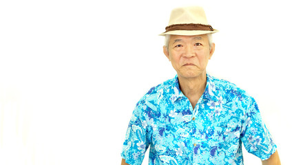 happy asian senior guy on blue hawaii shirt laughing on white is