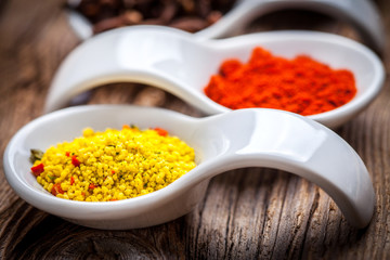 Dry spices in spoon.