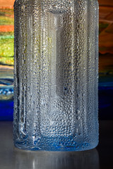 Cool water bottle on abstract background.