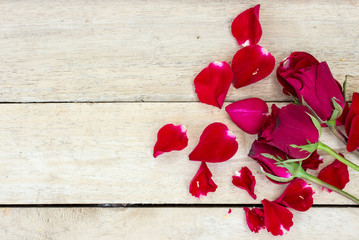 Valentines day background with red roses on wood texture for bac