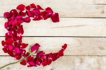 Rose Petals Border on a wooden table