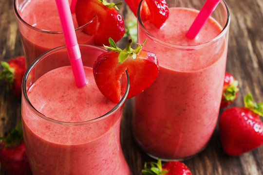 strawberry smoothie and ripe strawberries