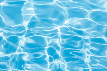 Blue ripped water in swimming pool / water background