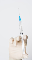 hand with syringe