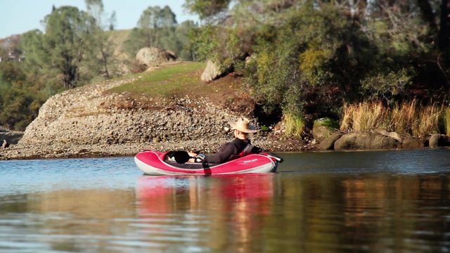 kayak woman in the river - 1080p. Woman kayaking at the Sacramento River in CA. during winter - Full HD