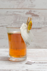 Cup of tea on wooden rustic background