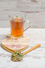 Cup of tea on wooden rustic background