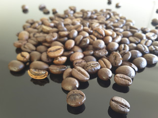 Сoffee beans on a glass table