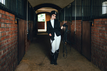 Fashion woman jokey and horse