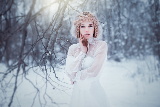 Mistery woman in winter forest