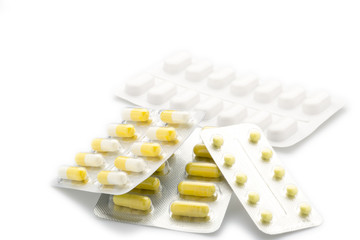 Yellow capsules pill blister pack
