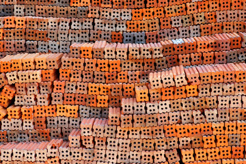 Stack of bricks near construction site