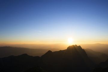 Obraz premium twilight between sunset at the top of the mountain at Chiangmai,Thailand