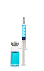 Sterile medical vial with blue medication solution, ampoule, and syringe isolated on a white background.