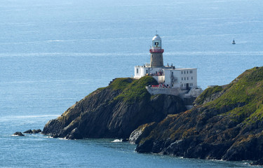 Fototapeta na wymiar Cliffs in Howth and lighthouse, Ireland