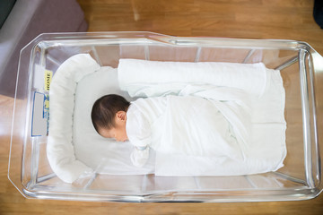Asian newborn baby in hospital, delivery room © alice_photo