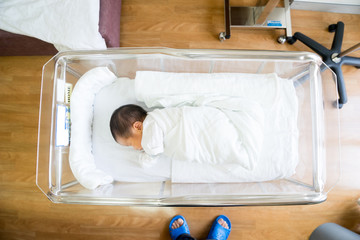 Asian newborn baby in hospital, delivery room © alice_photo