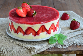 Strawberry cake; Fraisier cake on wooden background