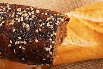 baguette bread with poppy seeds and sesame rustic style
