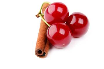 cherry and cinnamon isolated on white background