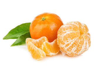 Ripe mandarin with leaves close-up on a white background. Tangerine orange with leaves on a white...