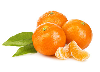 Ripe mandarines with leaves close-up on a white background. Tangerines with leaves on a white...