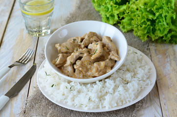 Meat in Creamy Sauce with Rice 