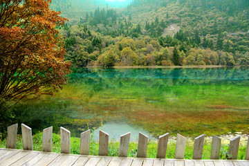 Jiuzhaigou National Park Sichuan focus at the fence, China