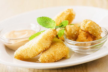 fried cheese with sauce