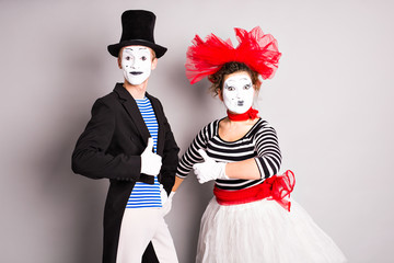 Two mimes man and  woman.The concept of Valentine's Day, April Fool's Day