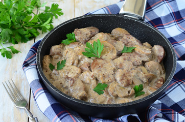 Chicken Liver in Creamy Sauce on Frying Pan