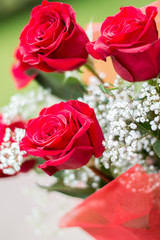 Bouquet of roses with grass