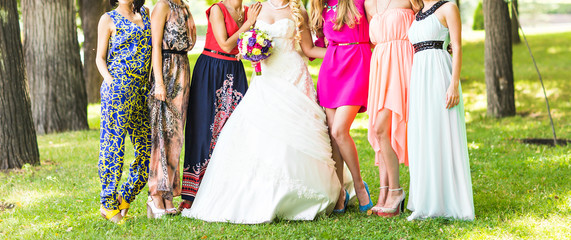 Stylish bridesmaids have fun with bride
