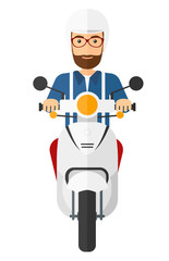 Man riding scooter.